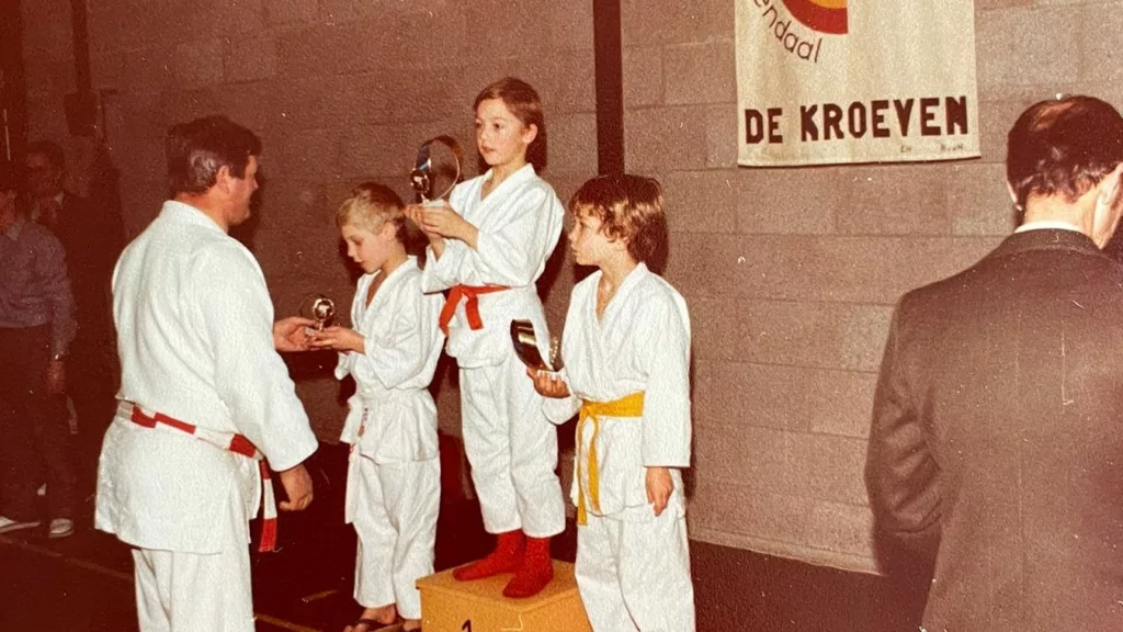 Picture of young Leon Bax with junior national championship trophy.
